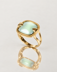 Bague Concorde en plaqué or avec zircon bleu turquoise, vue de face – Jossepo