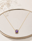 Détail collier Cassis zirconia violette plaqué or 18 carats – Jossepo