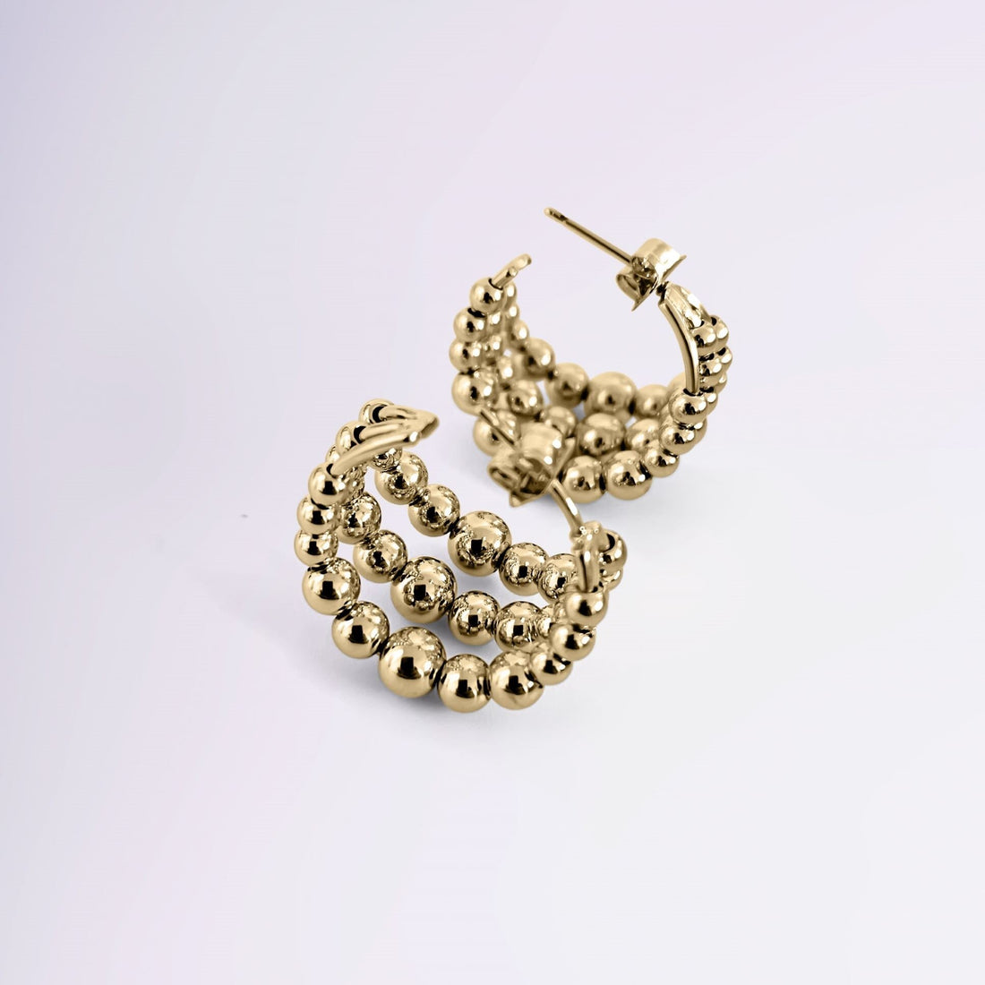 Boucles Elisabetta en plaqué or 18 carats, design travaillé – Jossepo