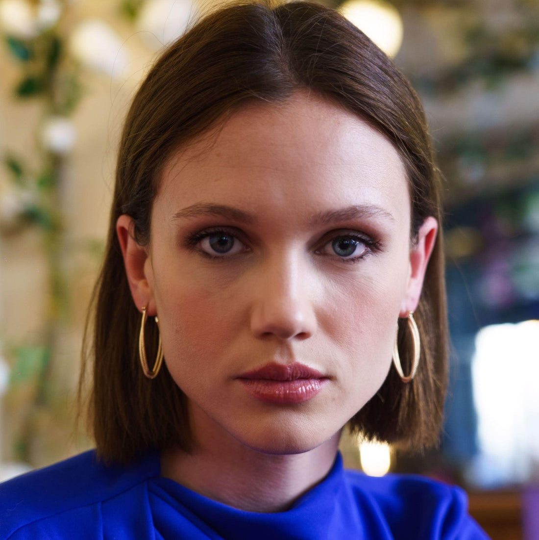 Boucles Iris design ovale élégant en finition dorée – Jossepo