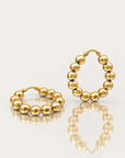Créole dorée Félix portée à l’oreille, boucles d’oreilles à boules élégantes pour femme – Jossepo